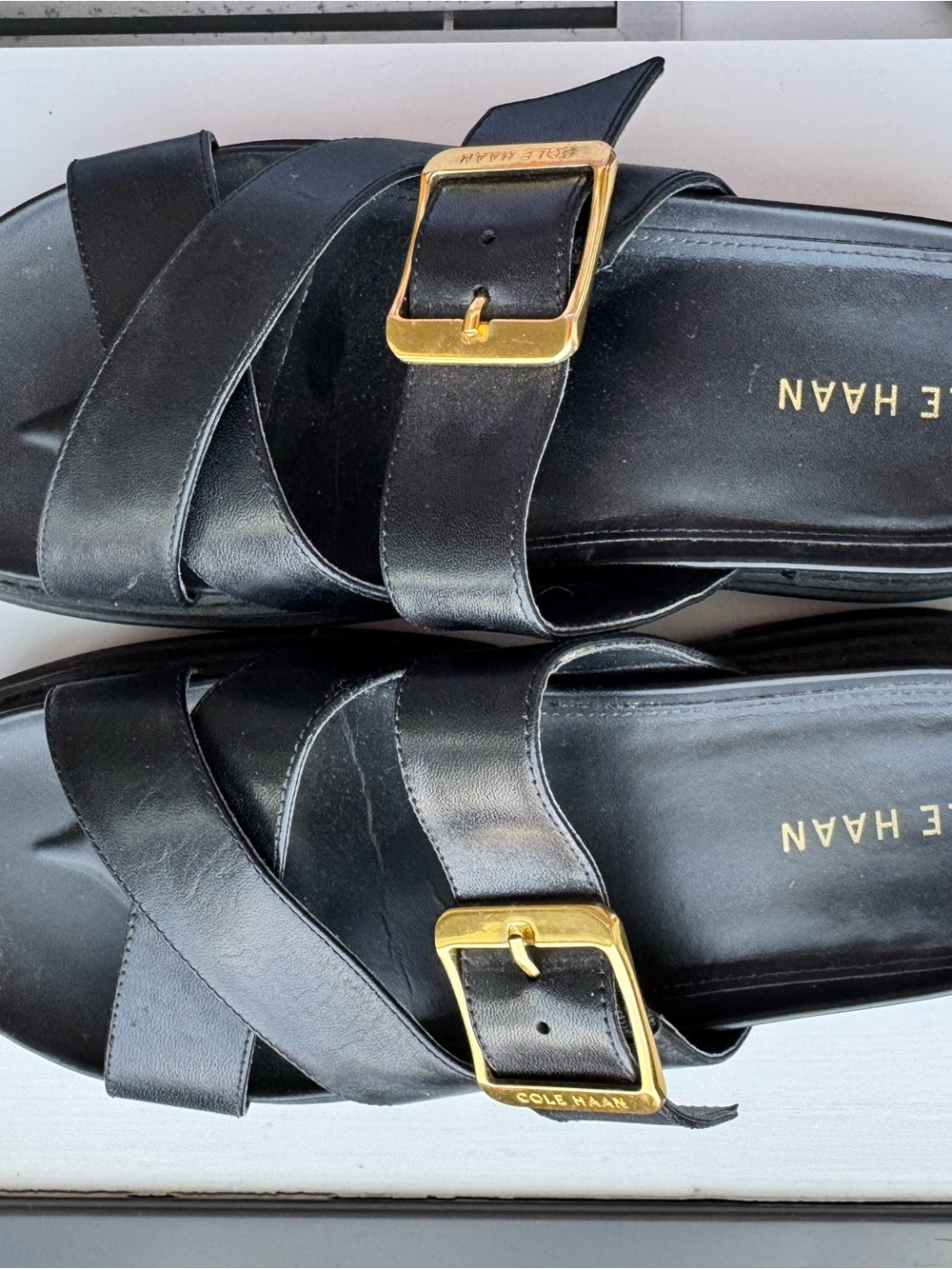 Cole Haan Black Leather Slide Mules with Gold Buckles